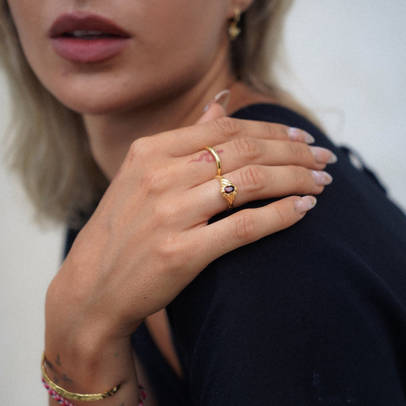 Gold Alexis Ring showing deep red garnet stone in pebble setting - 14k Gold Vermeil Jewelry