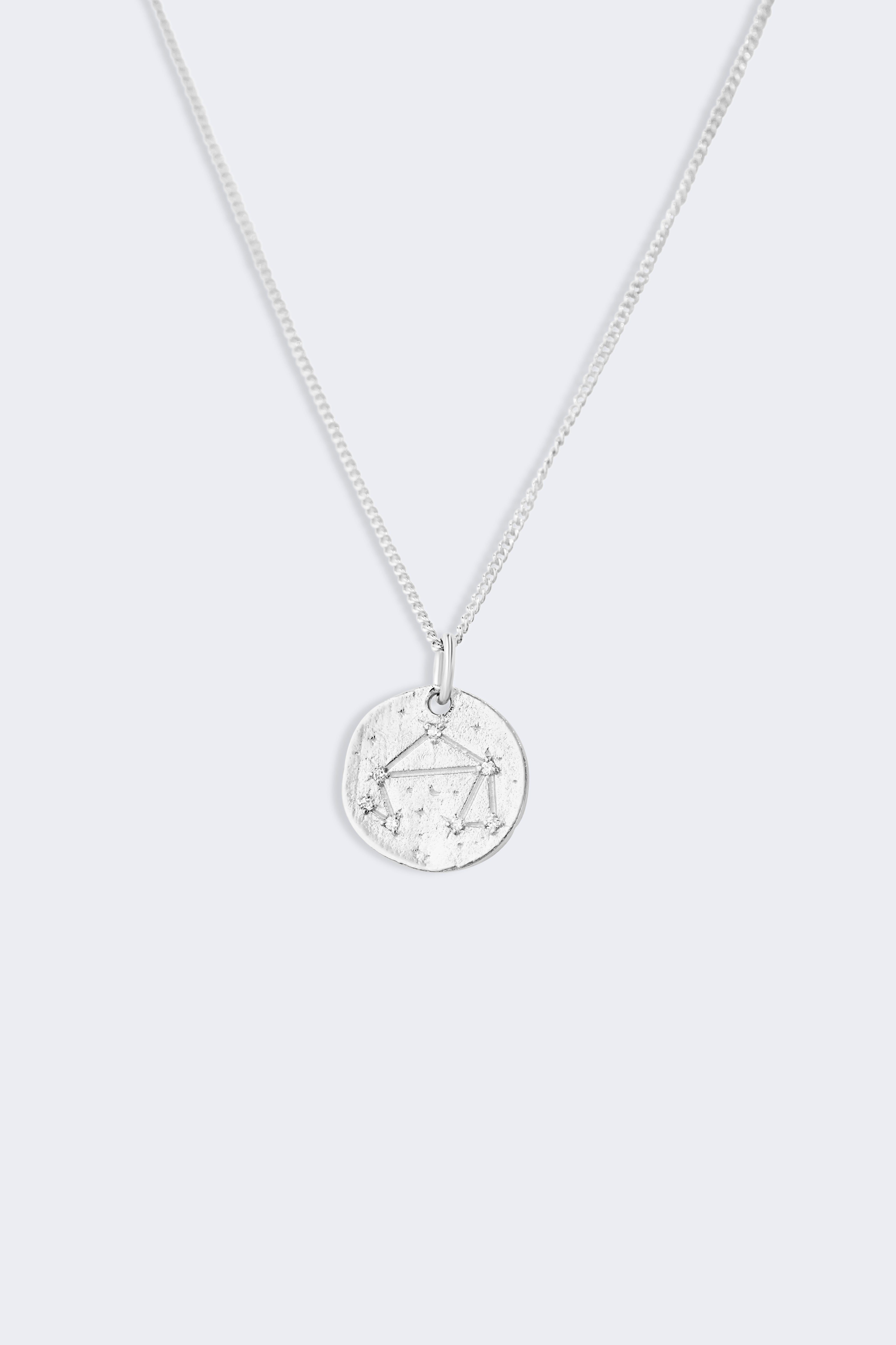 Libra star constellation necklace on a fine curb chain, pendant showing the Libra constellation set with small zircons