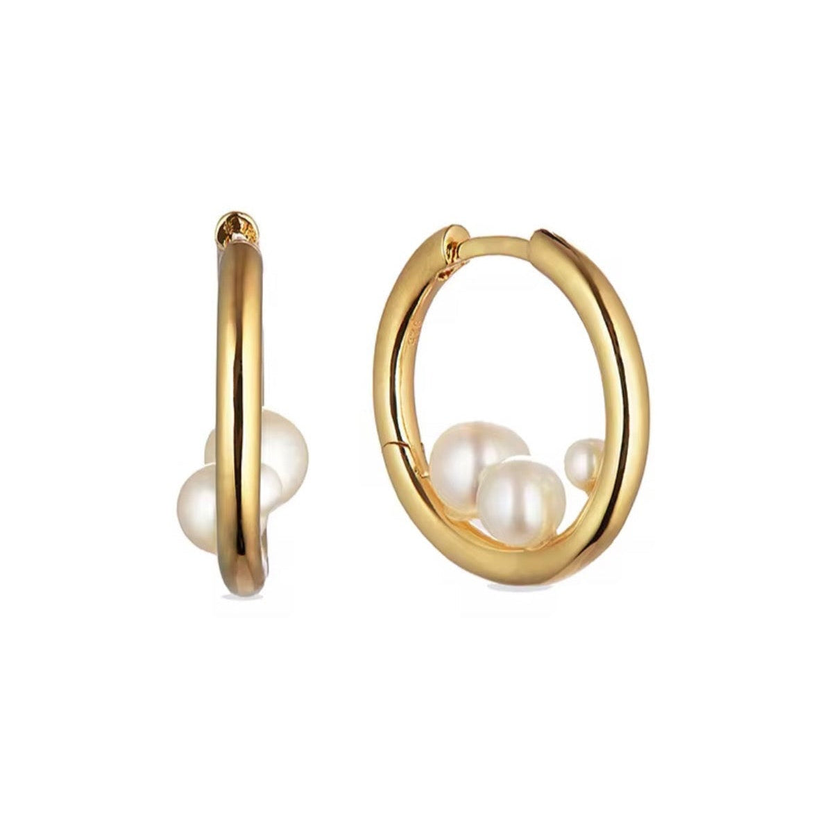 Delphine Pearl Huggie Earrings close-up on ear - 18k Gold Vermeil Bridal Jewelry