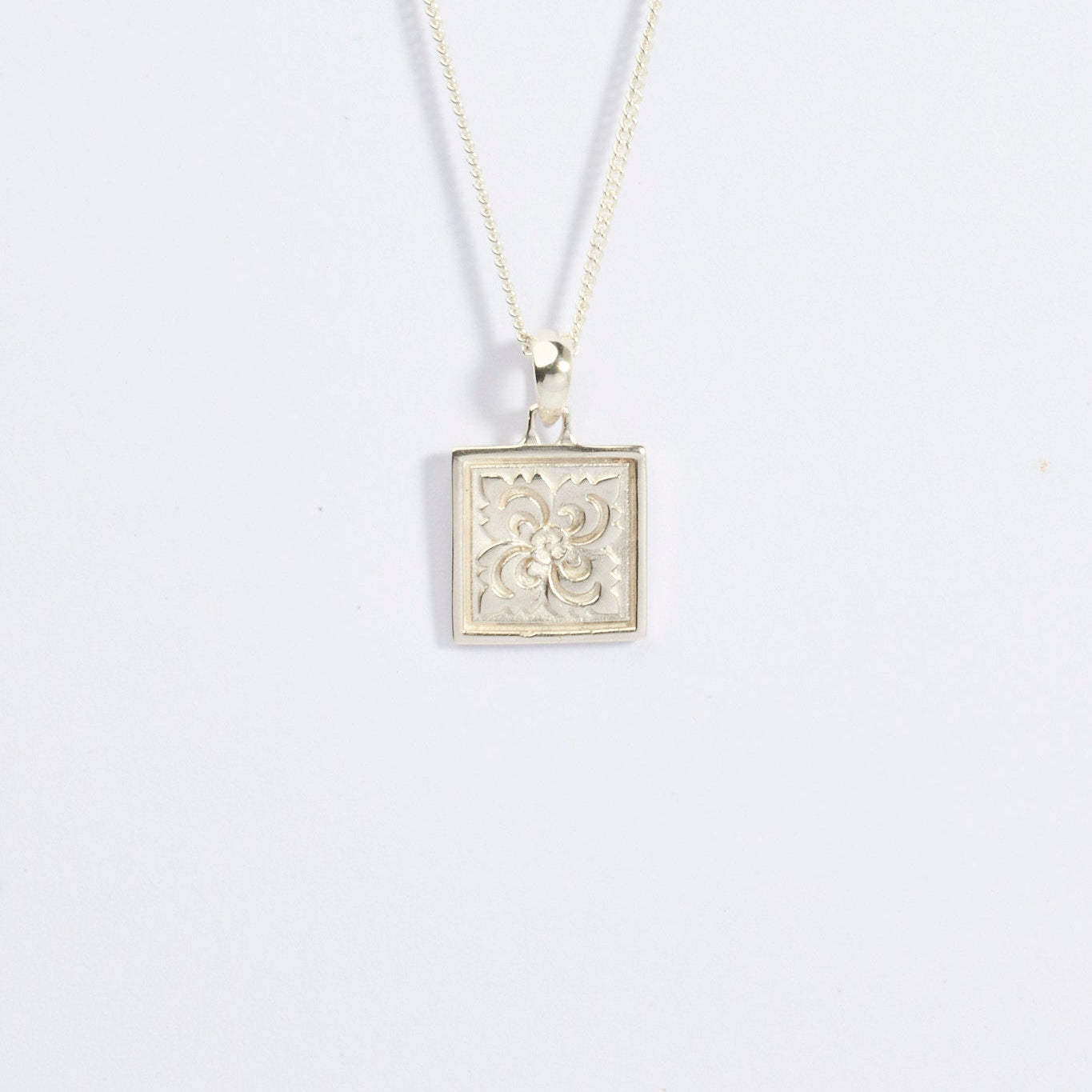 Temple Flower Pendant Necklace worn on model showing 14k gold vermeil finish and delicate floral design on 45cm chain - Maraux spiritual jewellery