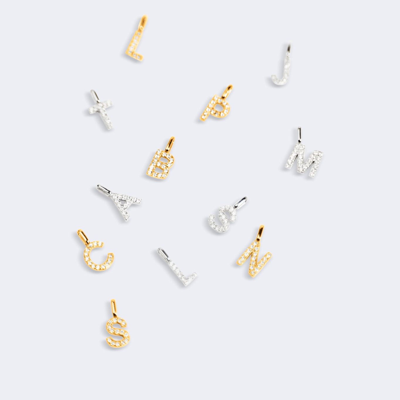 Initial pendant A-Z with zircon stones in gold vermeil