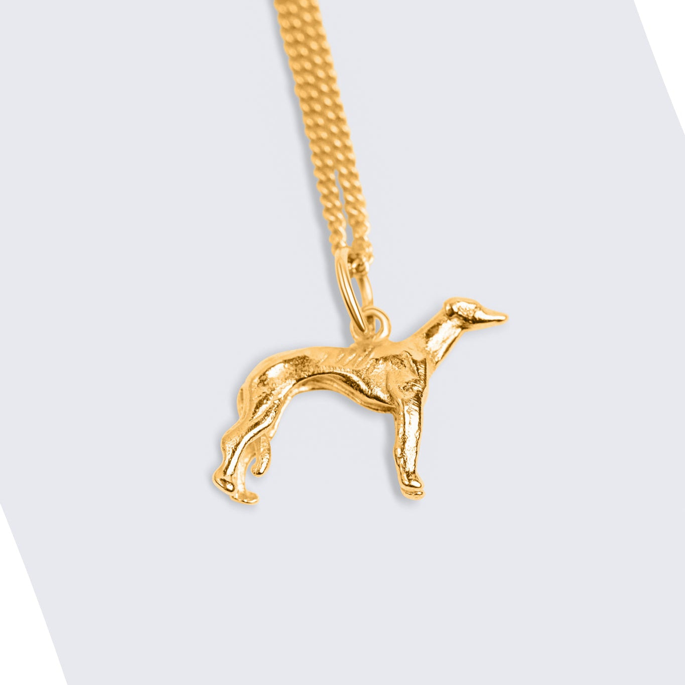 A gold-tone Italian Greyhound pendant necklace on a matching chain