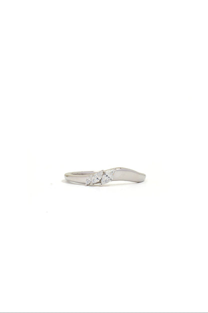 Silver ring with small stones on a white background